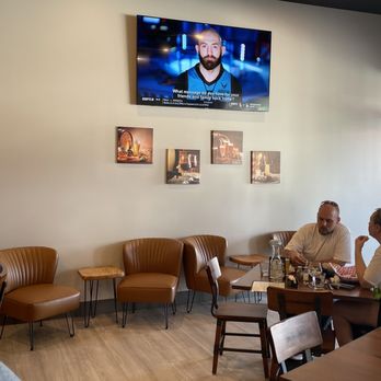 Twisted Cork & Taphouse - people sitting at tables in a restaurant - Salad Near Me - Manson, Washington Twisted Cork & Taphouse - people sitting at tables in a restaurant - Salad Near Me - Manson, Washington