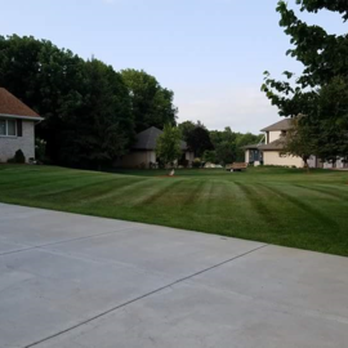 Veteran Lawn Service - a driveway and a house - Landscaping Near Me - Ham Lake, Minnesota Veteran Lawn Service - a driveway and a house - Landscaping Near Me - Ham Lake, Minnesota