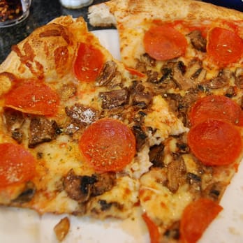 Ernesto's - This is "a slice". (two giant ones) - Pizza Near Me - Boston, Massachusetts