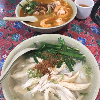 Malay Restaurant - Back: Shrimp Noodle Soup, Front: Shredded Chicken Ho Fun (flat rice noodle) - Malaysian Near Me - Flushing, New York