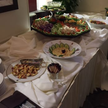 Miami Beach Golf Course - reception- hummus, cheeses, salsa.  The skirt around the table is falling off. - Golf Near Me - Miami Beach, Florida