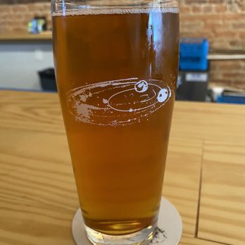 Little Oblivion Brewing - a glass of beer on a table - Breweries Near Me - Graham, North Carolina