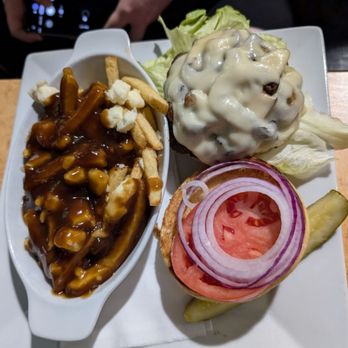 Taps Brewhouse - Taps original with swiss and poutine - Pubs Near Me - Niagara Falls, Ontario Taps Brewhouse - Taps original with swiss and poutine - Pubs Near Me - Niagara Falls, Ontario