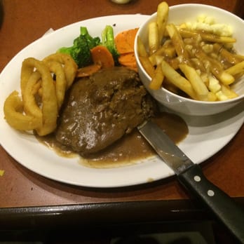 The Shire Restaurant and Brew Pub - Meatloaf with poutine - Pubs Near Me - Simcoe, Ontario The Shire Restaurant and Brew Pub - Meatloaf with poutine - Pubs Near Me - Simcoe, Ontario