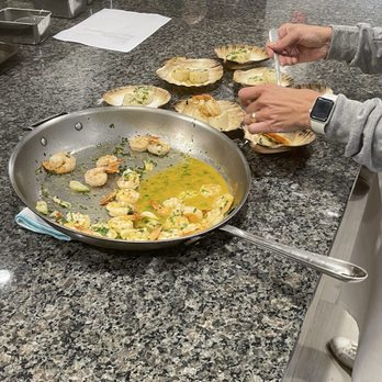 Kitchen Conservatory - Shrimp and scallop scampi being plated - Cooking Schools Near Me - Saint Louis, Missouri Kitchen Conservatory - Shrimp and scallop scampi being plated - Cooking Schools Near Me - Saint Louis, Missouri