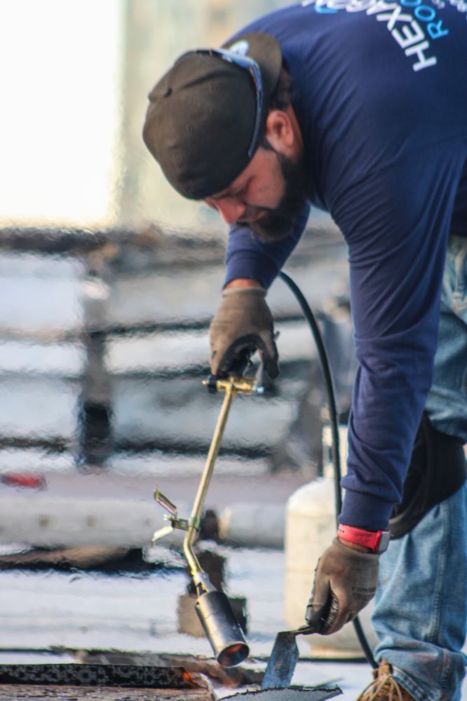 Slide of Hexagon Roofing Inc.
