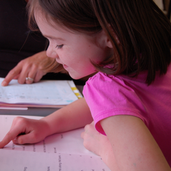 The Fluency Factory - Tess learning to read--and being really happy doing it!