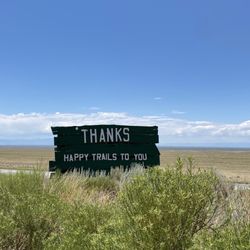 Great Sand Dunes Oasis - Happy Trails sign