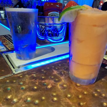 Ford's Garage Plano - Cold beer and frozen strawberry margarita - Burgers Near Me - Plano, Texas Ford's Garage Plano - Cold beer and frozen strawberry margarita - Burgers Near Me - Plano, Texas