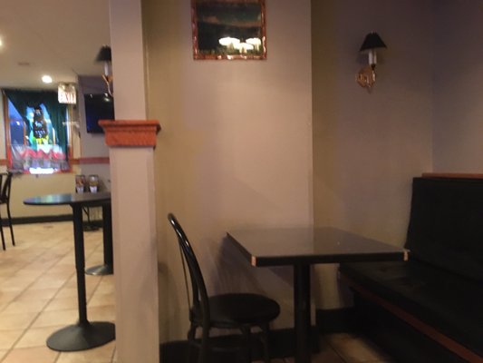 Photo of Pupuseria Mi Ranchito - Kingston, NY, US. 2 Tables near the Bar