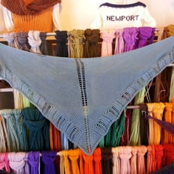 Knitting Needles - Shawl displayed in front of Paternayan Persian yarn display
