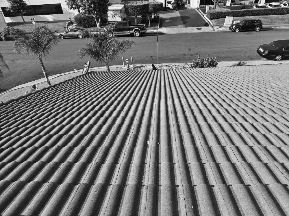 Slide of Monarch Roofing