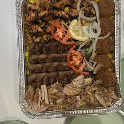 Nay Restaurant - The family platter, beef kebabs, boneless chicken, yellow rice, chicken shawarma, falafel, veggies, hummus, lots of bread, feeds 6.