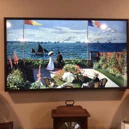 Pic of the framed TV with dark frame.  It comes in other colors.