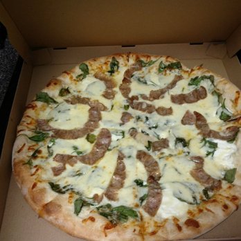 Rizzotto's Pizzeria - Spinach White Pizza with Italian Sausage. This pizza was the best. I definitely recommend Rizzotto's. - Italian Near Me - Largo, Florida Rizzotto's Pizzeria - Spinach White Pizza with Italian Sausage. This pizza was the best. I definitely recommend Rizzotto's. - Italian Near Me - Largo, Florida