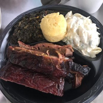 Captains BBQ - Captains Combo Sampler with St Louis ribs, brisket macaroni salad, cornbread and collards (best I've ever had) - Barbeque Near Me - Palm Coast, Florida