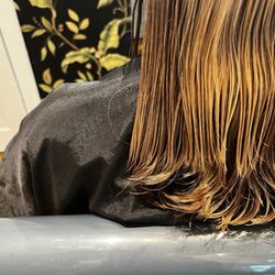 Fine Line Hair Design - See the uneven layering job in back