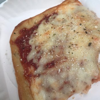 Giorgio's Pizza & Subs - In my car eating my slice - Pizza Near Me - Exton, Pennsylvania