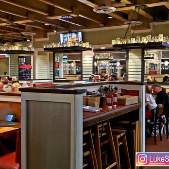 Chili's - people sitting at tables in a restaurant - Bars Near Me - East Peoria, Illinois