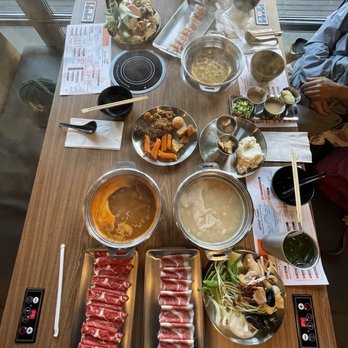 All That Shabu - Soup base. Left is spicy beef. Top is original house. Bottom right is miso. - Buffets Near Me - Alhambra, California All That Shabu - Soup base. Left is spicy beef. Top is original house. Bottom right is miso. - Buffets Near Me - Alhambra, California