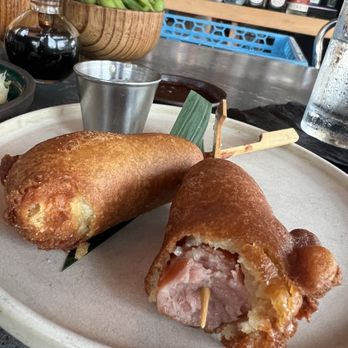 Sushi Bichi - Kurobuta corn dogs. The Japanese sausage was delicious! It comes with a mustard sauce that's perfect with the sausage. - Sushi Bars Near Me - Miami Beach, Florida