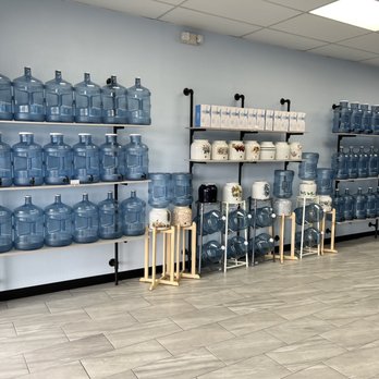7 Plus - a room full of blue water bottles - Water Stores Near Me - Las Vegas, Nevada 7 Plus - a room full of blue water bottles - Water Stores Near Me - Las Vegas, Nevada