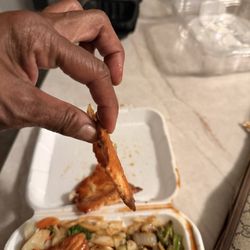 Extreme Teriyaki Grill Express - Thin ahh piece of salmon and Crispy on one side and she told me, that is how they cook it! 6oz piece of Salmon Jerky