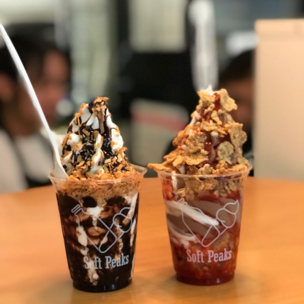 Soft Peaks - Rocky Mountain with toasted coconut, chocolate syrup and chocolate vanilla swirl, North Pole Breakfast with cereal strawberry and swirl - Ice Cream & Frozen Yogurt Near Me - Vancouver, British Columbia Soft Peaks - Rocky Mountain with toasted coconut, chocolate syrup and chocolate vanilla swirl, North Pole Breakfast with cereal strawberry and swirl - Ice Cream & Frozen Yogurt Near Me - Vancouver, British Columbia