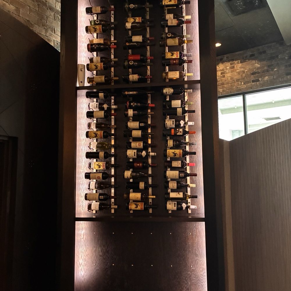 CMX Cinebistro Hyde Park - Wine rack in lobby - Cinema Near Me - Tampa, Florida CMX Cinebistro Hyde Park - Wine rack in lobby - Cinema Near Me - Tampa, Florida