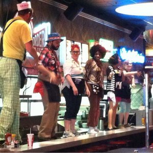 Photo of Ed Debevic's - Chicago, IL, United States. Dancing on the counter top.