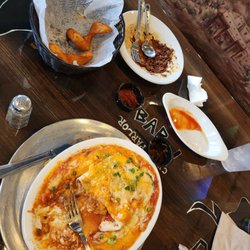 Bar J Chili Parlor - Burrito drowning in cheese and sauce, fries that were too girthy, chili that just looked like a bowl of ground meat.