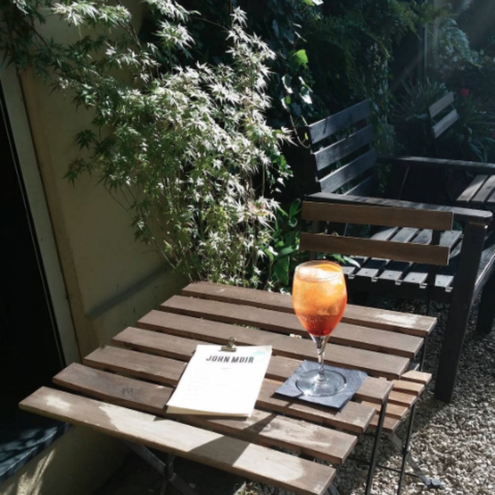 Aperol Spritz on the sunny patio of John Muir