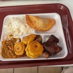 Normita's - Rice, habichuelas, tostones, pork, empanada