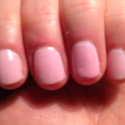 Amy's Nails & Spa - Other hand: lumpy polish and notice ring finger, she went over it after screwing it up. Polish doesn't extend to sides or base.