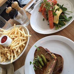 Reuben Sandwich, Super Green Salad with Salmon and shoestring fries Reuben Sandwich, Super Green Salad with Salmon and shoestring fries