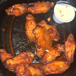 chicken wings in a frying pan