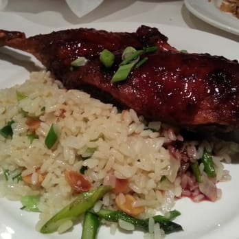 Circles Bistro - Crispy duck w/ black cherry brandy sauce, rice pilaf & sauteed green beans ... yum! - New American Near Me - Tampa, Florida Circles Bistro - Crispy duck w/ black cherry brandy sauce, rice pilaf & sauteed green beans ... yum! - New American Near Me - Tampa, Florida