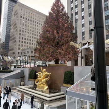 Rockefeller Center - View of the tree and ice skating rink below. - Shopping Centers Near Me - New York, New York Rockefeller Center - View of the tree and ice skating rink below. - Shopping Centers Near Me - New York, New York