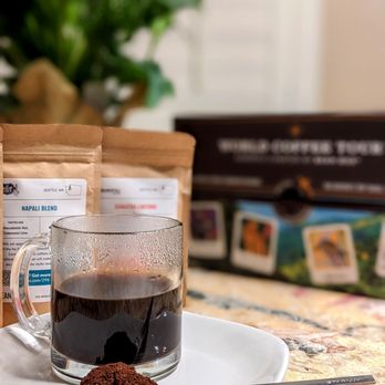 Bean Box - a cup of coffee and a spoon on a plate - Coffee Roasteries Near Me - Seattle, Washington Bean Box - a cup of coffee and a spoon on a plate - Coffee Roasteries Near Me - Seattle, Washington
