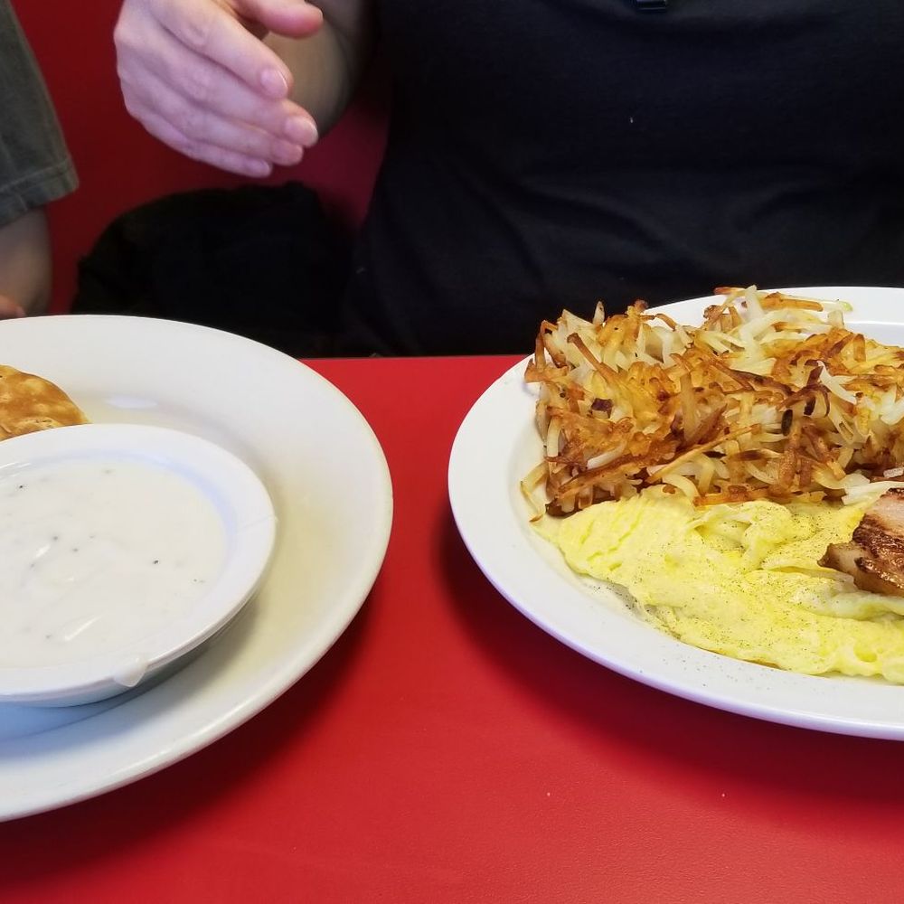 Golden Biscuit - The Wife's breakfast... scrambled, hashbrowns, half ham steak and biscuit & gravy. Excellent in all aspects. - Breakfast & Brunch Near Me - Owasso, Oklahoma