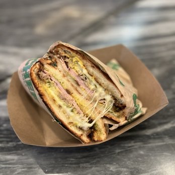 The Chef Truck - medianoche: roasted mojo pork, ham, cheese, pickles, mustard, torta bun + salsa verde sandwiched= $17 - Food Trucks Near Me - Las Vegas, Nevada The Chef Truck - medianoche: roasted mojo pork, ham, cheese, pickles, mustard, torta bun + salsa verde sandwiched= $17 - Food Trucks Near Me - Las Vegas, Nevada