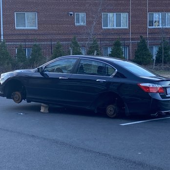 Lync at Alterra - Car on bricks in visitor parking. - Apartments Near Me - Hyattsville, Maryland