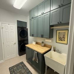 DB Enterprise - Completed project, I just finished adjusting the cabinets and installing the tilting hamper basket. What a lovely laundry room!