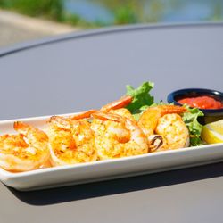 Lakeside Bar & Grill - Cajun Prawns with House-made cocktail sauce.