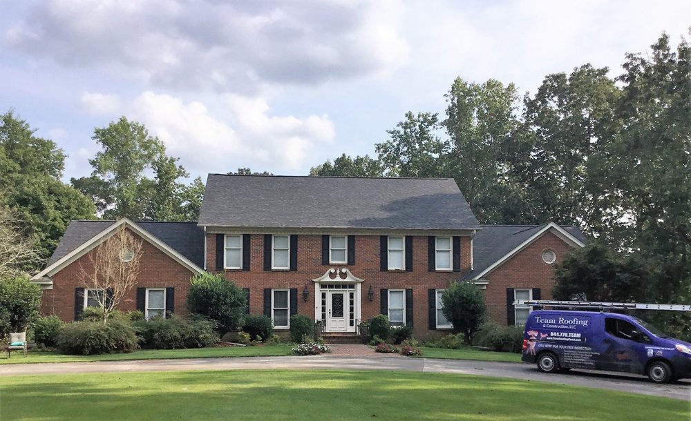 Slide of Team Roofing and Construction