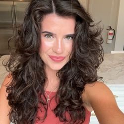 Jessie's Hair Illusions - Long layered cut with curtain bangs