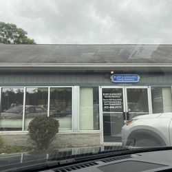 Grey & Associates Family Dentistry - Front of office. It's in the plaza after Chevy and right before  Pittsburgh Auto Depot