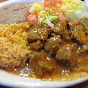 Camino Real Restaurant - carne guisada plate with rice and refried beans...tender and full of flavor - Mexican Near Me - Austin, Texas Camino Real Restaurant - carne guisada plate with rice and refried beans...tender and full of flavor - Mexican Near Me - Austin, Texas