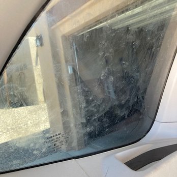 Squeaky Clean Car Wash - One of the rear windows. It's not like this could legitimately be overlooked. - Car Wash Near Me - Santa Fe, New Mexico