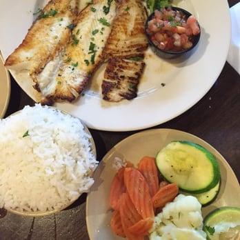 Sergio's Restaurant - Tilapia with white rice and side of steamed veggies. - Cuban Near Me - Miami, Florida Sergio's Restaurant - Tilapia with white rice and side of steamed veggies. - Cuban Near Me - Miami, Florida